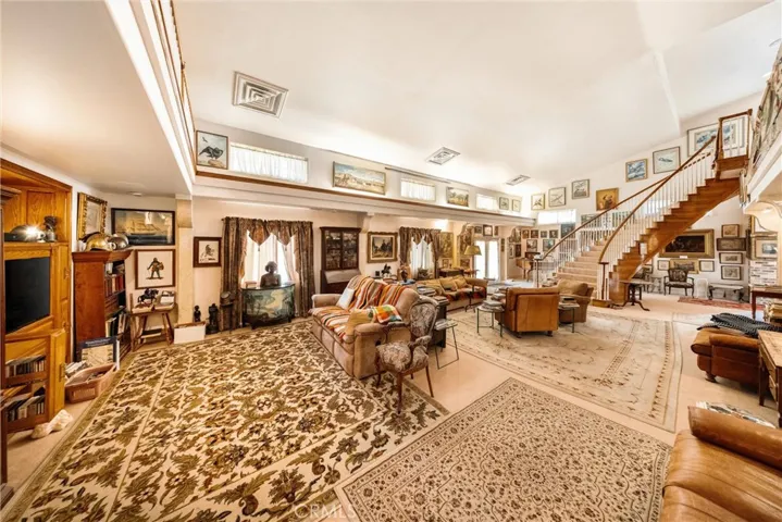 Grand living room looking towards staircase