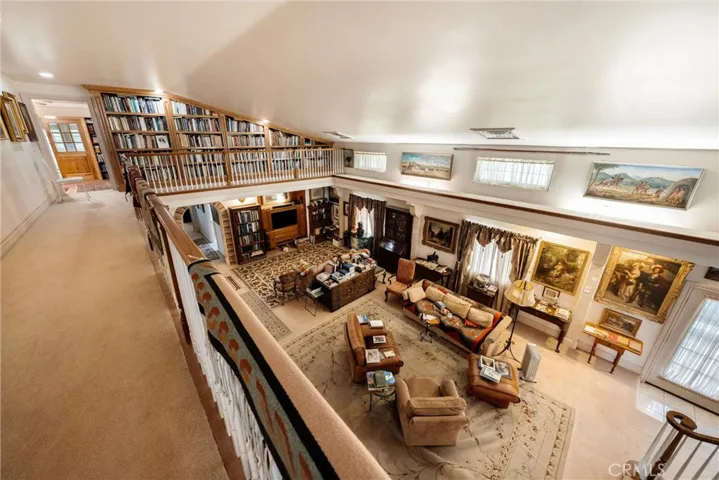 2nd story catwalk looking down to living room