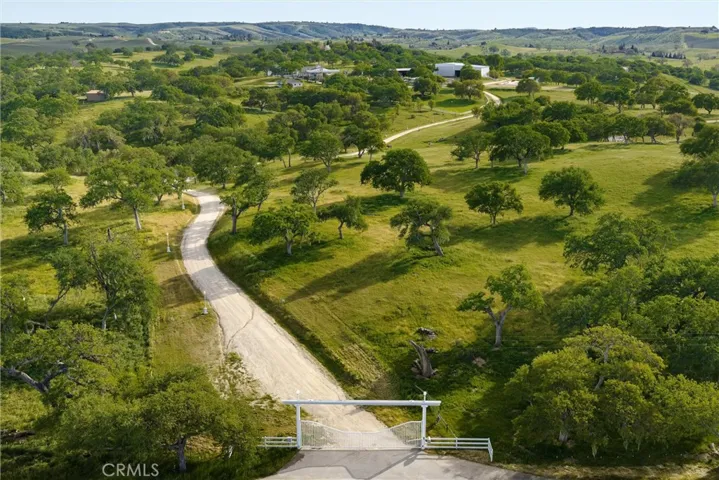 6685 El Pomar Drive is a gorgeous 83-acre estate property filled with majestic oak trees and over 30,000 square feet under roof of residences, garages and warehouses