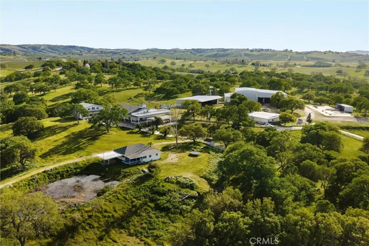 Overview of structures at the top of the property, showing warehouses in the back
