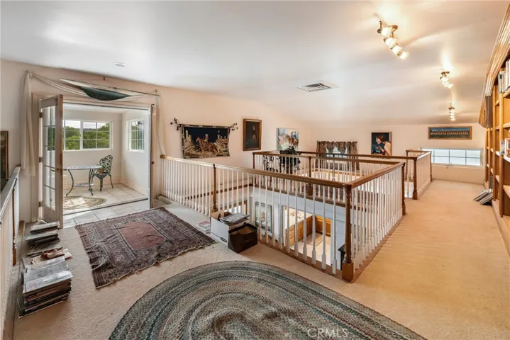 Upstairs portion of primary bedroom suite, with view nook