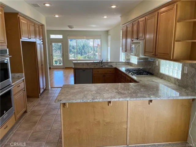 Kitchen with ample cabinetry and counter space