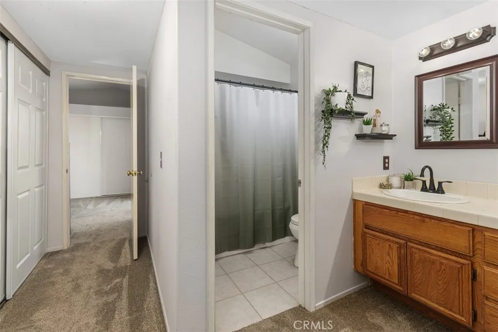 Private shower-in-soaking tub.