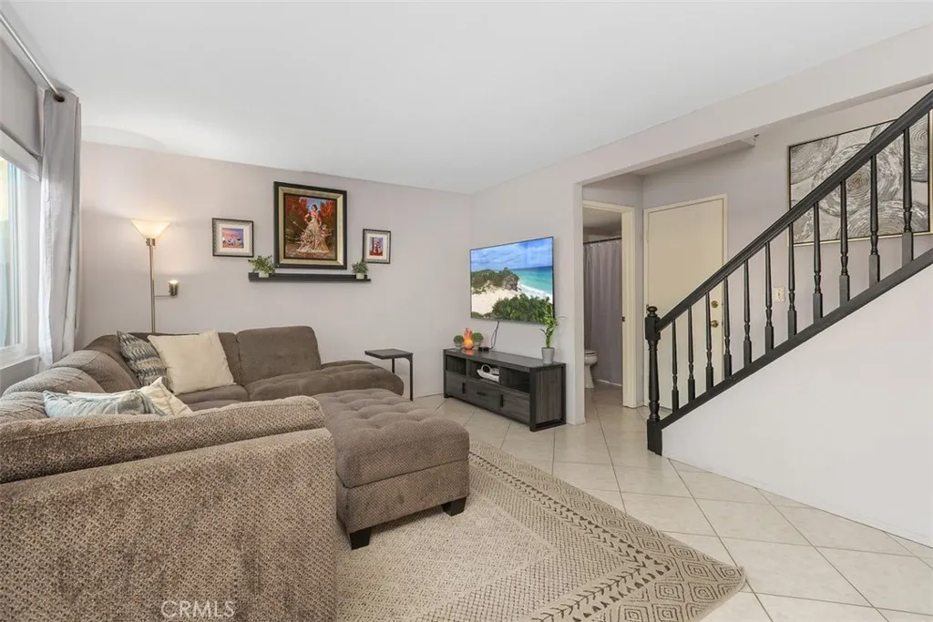 Just beyond the family room is a large laundry/utility room with great storage options.