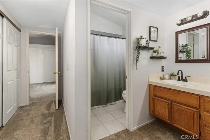 Private shower-in-soaking tub.