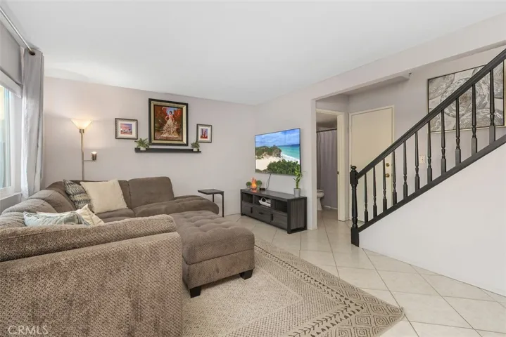 Just beyond the family room is a large laundry/utility room with great storage options.