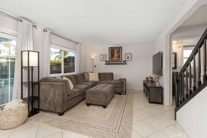 Plenty of windows and a large slider showcase the backyard oasis.