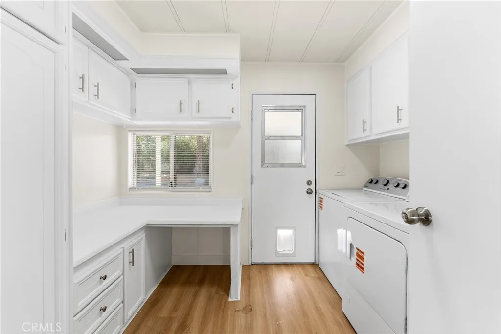 Laundry utility room with carport access