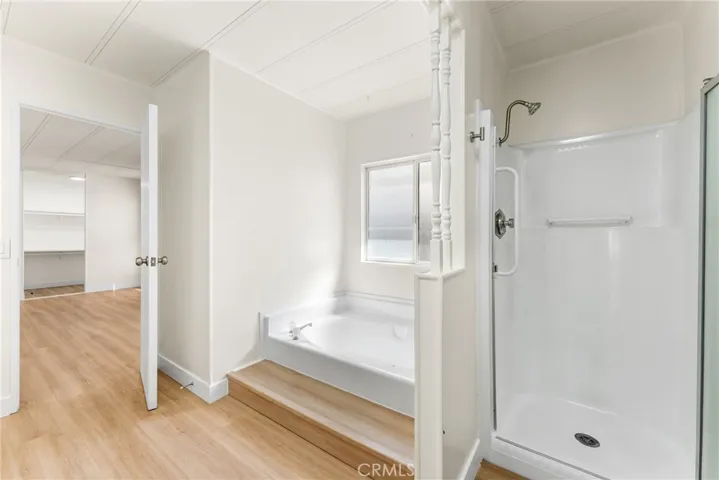 Separate soaking tub and walk in closet