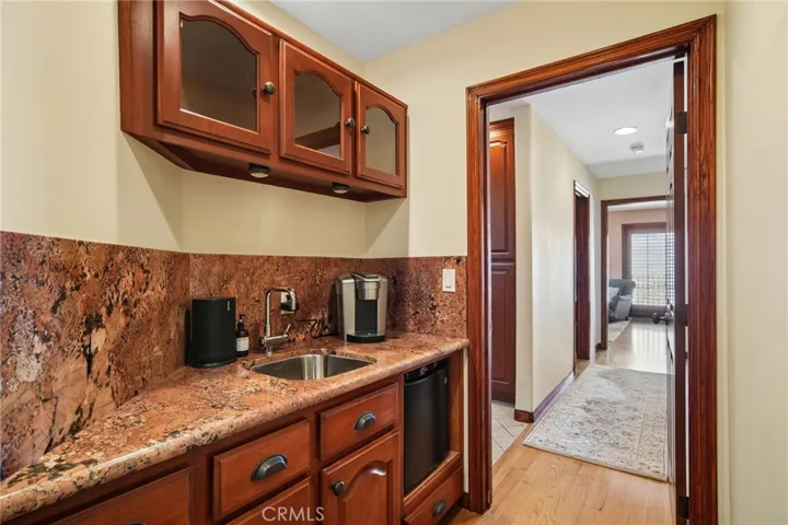 Wet bar just outside the Primary suite. Perfect for getting your morning coffee or a night cap.