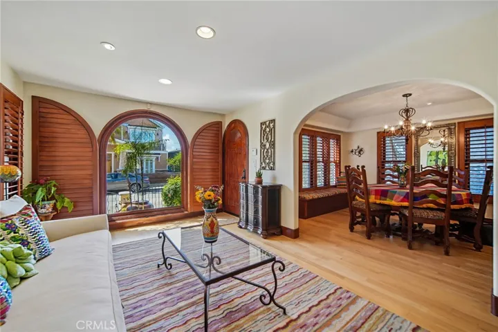 Light filled living room opens to the large dining room
