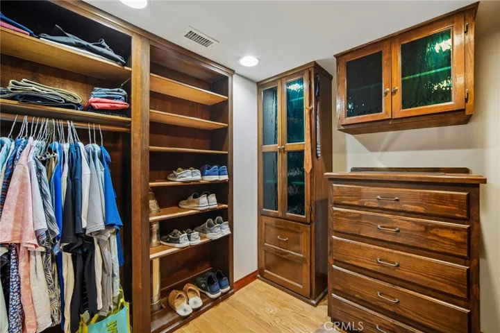 Other Primary bedroom's walk in closet.