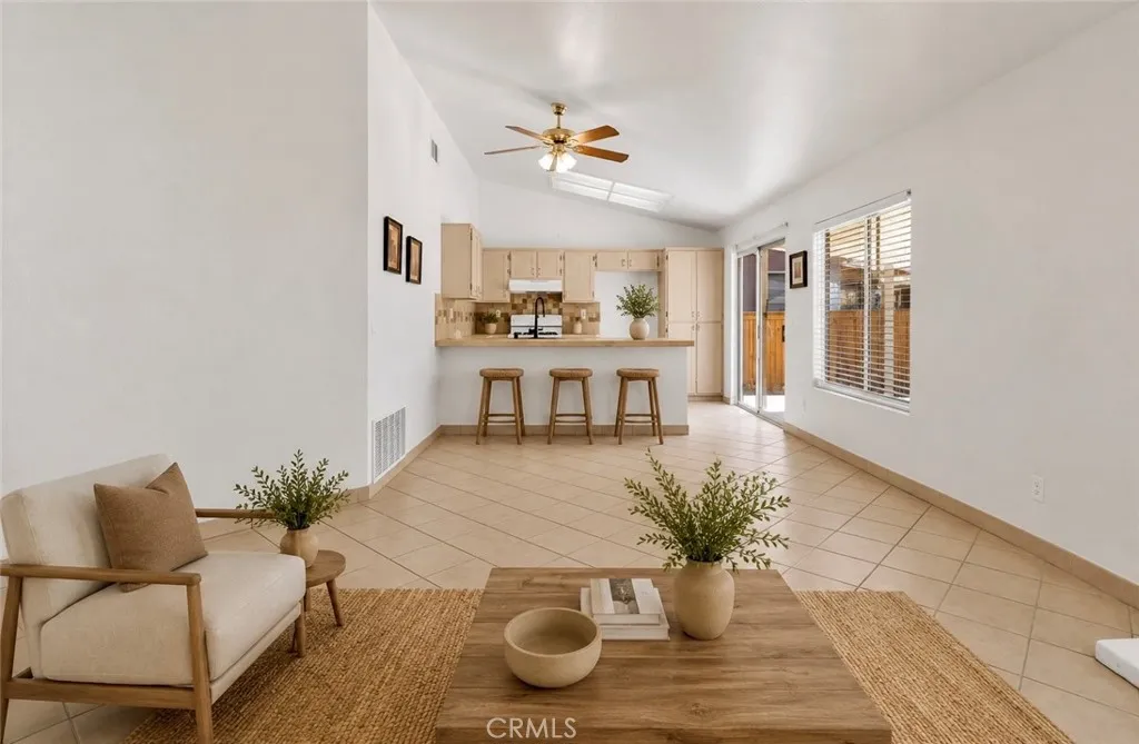 Photo has been virtually staged to help illustrate the home’s potential and inspire design ideas. Furniture, décor, landscaping, and accessories shown are digital renderings and are not included in the sale of the property.