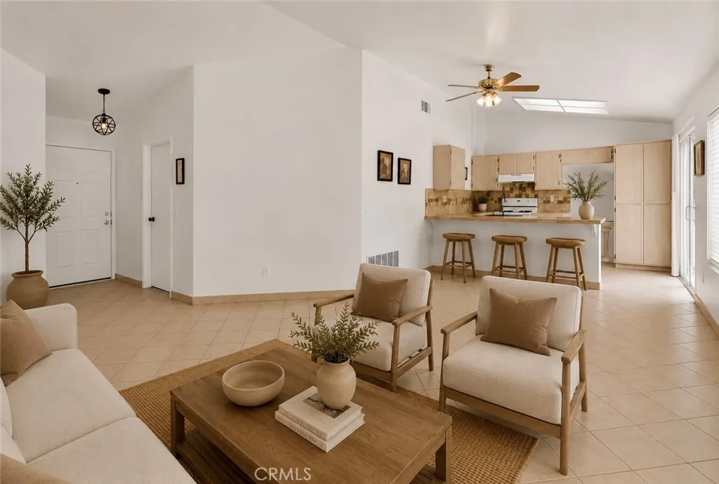 Photo has been virtually staged to help illustrate the home’s potential and inspire design ideas. Furniture, décor, landscaping, and accessories shown are digital renderings and are not included in the sale of the property.