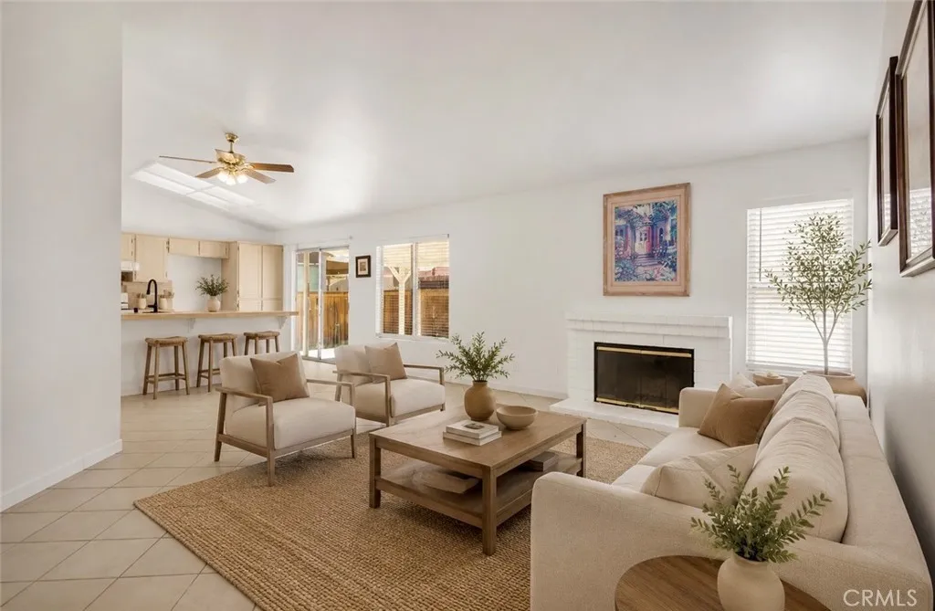 Photo has been virtually staged to help illustrate the home’s potential and inspire design ideas. Furniture, décor, landscaping, and accessories shown are digital renderings and are not included in the sale of the property.