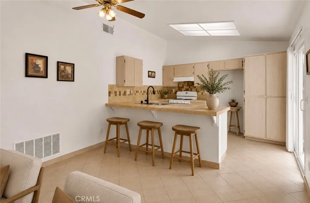 Photo has been virtually staged to help illustrate the home’s potential and inspire design ideas. Furniture, décor, landscaping, and accessories shown are digital renderings and are not included in the sale of the property.
