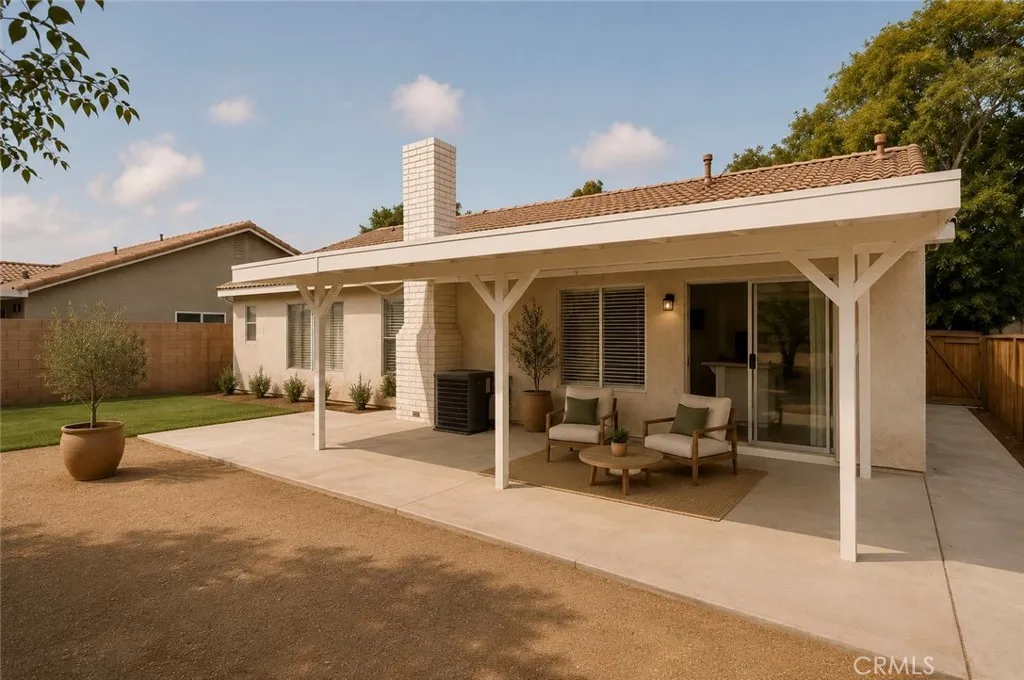 Photo has been virtually staged to help illustrate the home’s potential and inspire design ideas. Furniture, décor, landscaping, and accessories shown are digital renderings and are not included in the sale of the property.