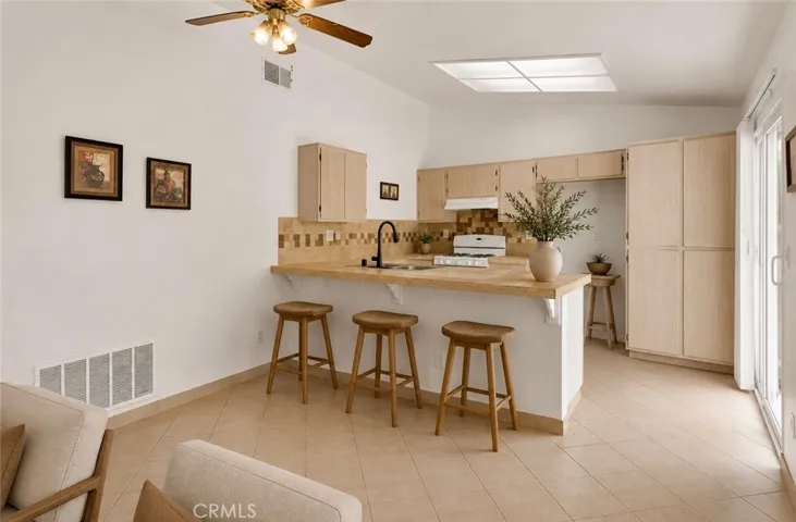 Photo has been virtually staged to help illustrate the home’s potential and inspire design ideas. Furniture, décor, landscaping, and accessories shown are digital renderings and are not included in the sale of the property.