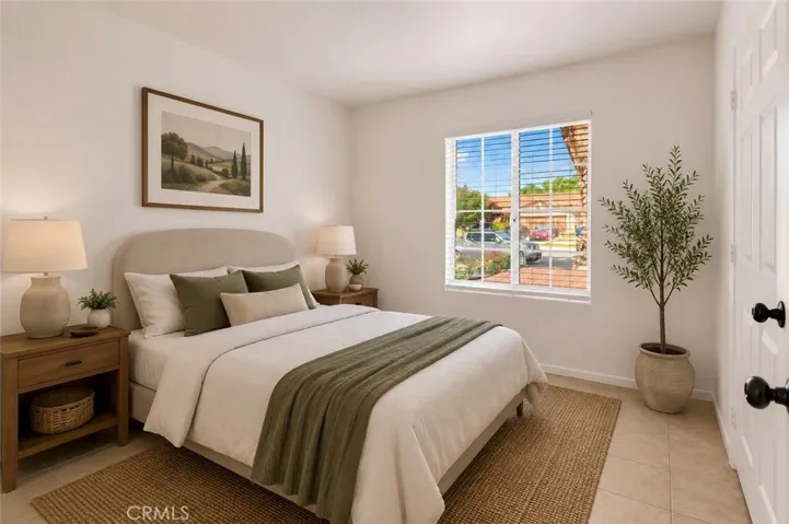 Photo has been virtually staged to help illustrate the home’s potential and inspire design ideas. Furniture, décor, landscaping, and accessories shown are digital renderings and are not included in the sale of the property.