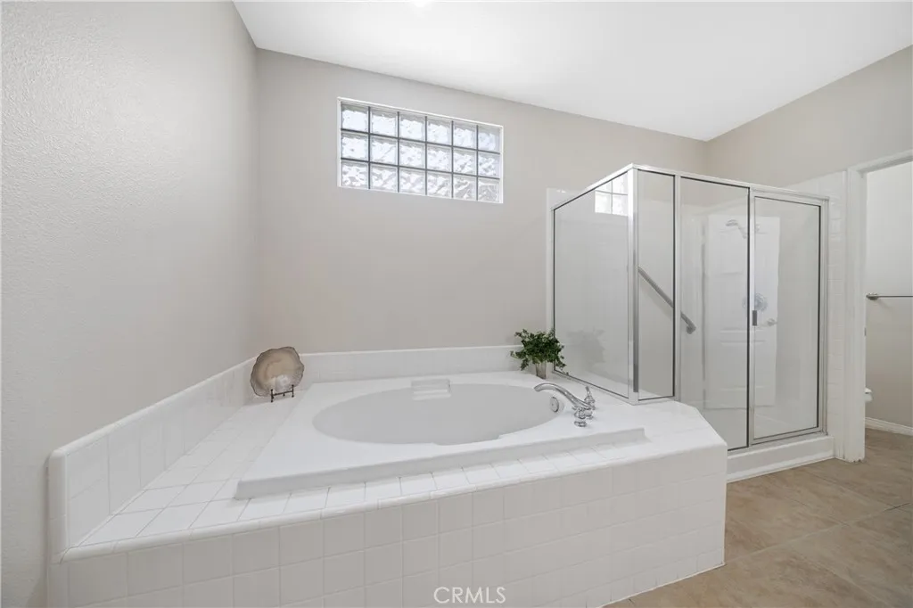 Soaking tub and shower.