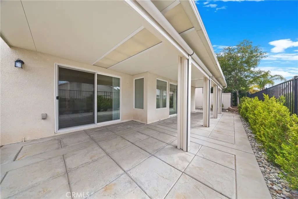 Your patio has roll-down shades across the back for added privacy.