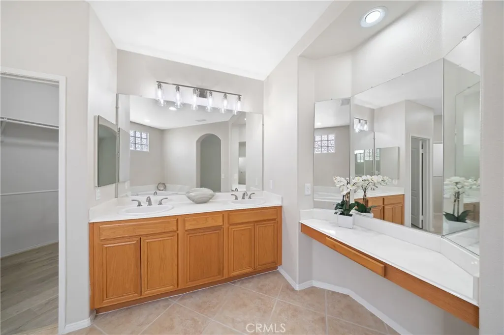 Your luxurious primary bath has updated lighting, faucets were just replaced.