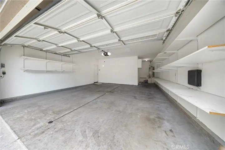 Your garage has plenty of space for 2 vehicles and there is an alcove for golf cart, workbench or storage.