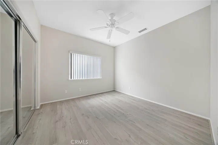 Bedroom 2 with a ceiling fan.