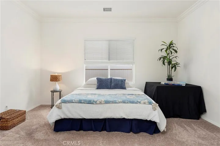 The den can be used as a third bedroom. A California King sized bed fits very comfortably here.