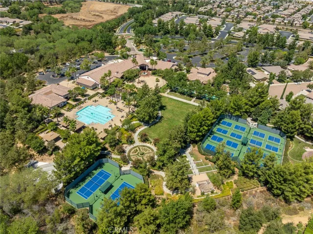 Tennis & Pickleball courts, in addition to Bocce Ball, fitness center, and theatre.