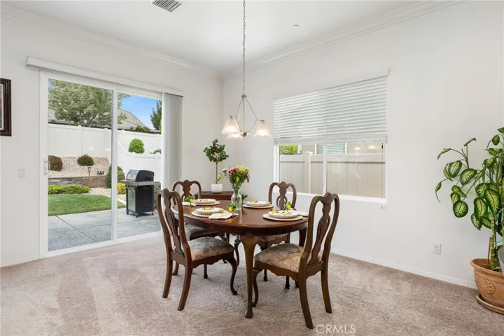Enjoy dining surrounded by natural lighting from windows