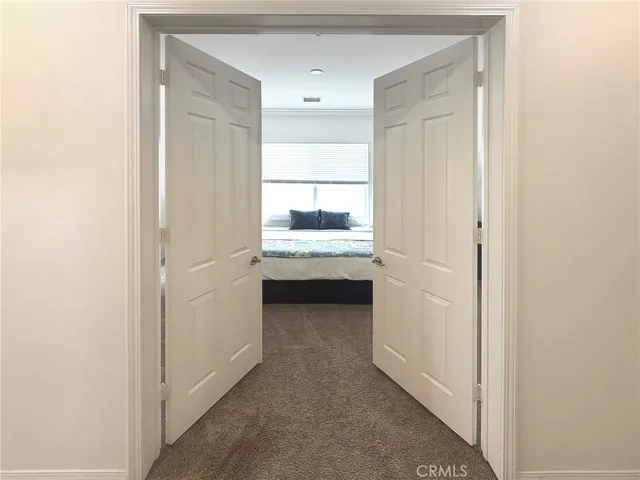 Double Doors into the den or third bedroom