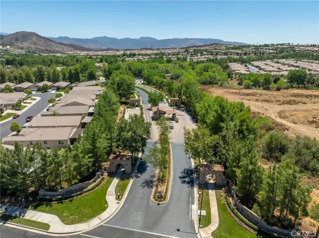 Gated entry with guards provides additional security for residents.