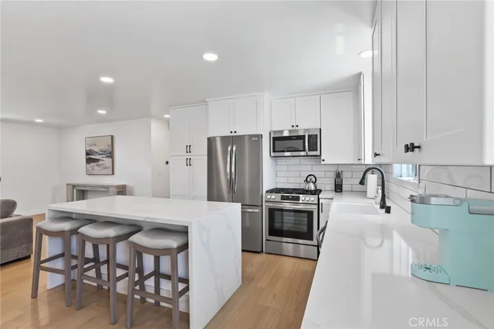 Kitchen opens to Living room for easy entertaining.