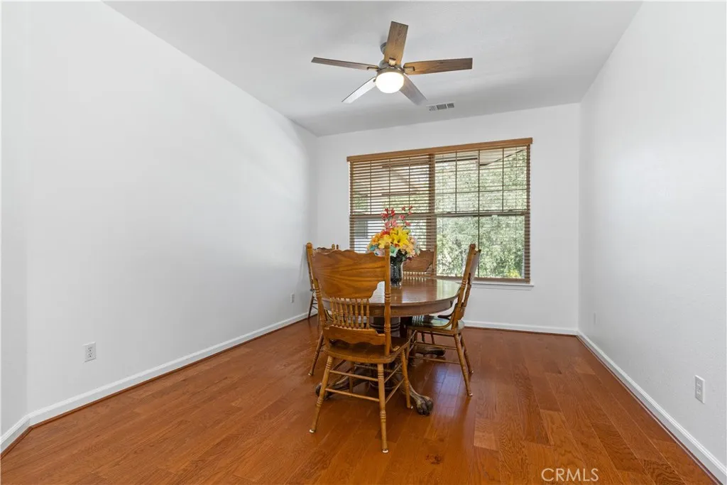 Formal dining this picture is not accurate makes room look narrow and it's NOT it very large and could make another bedroom if needed because you have informal dining to side of kitchen
