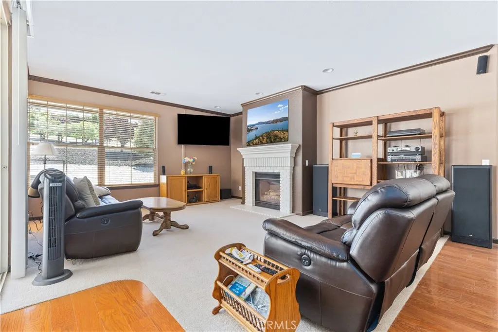 Large family room open to kitchen, dining 
