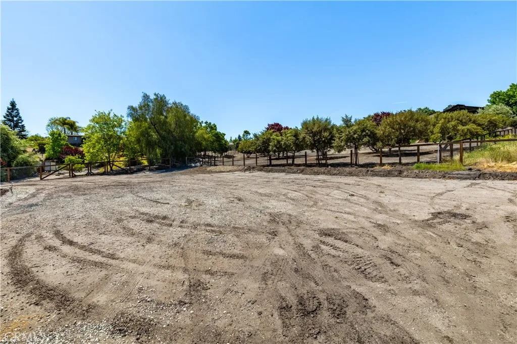 Huge flat area just above the home. Look at the privacy and pretty views. Maybe build RV garage or auxiliary home.
