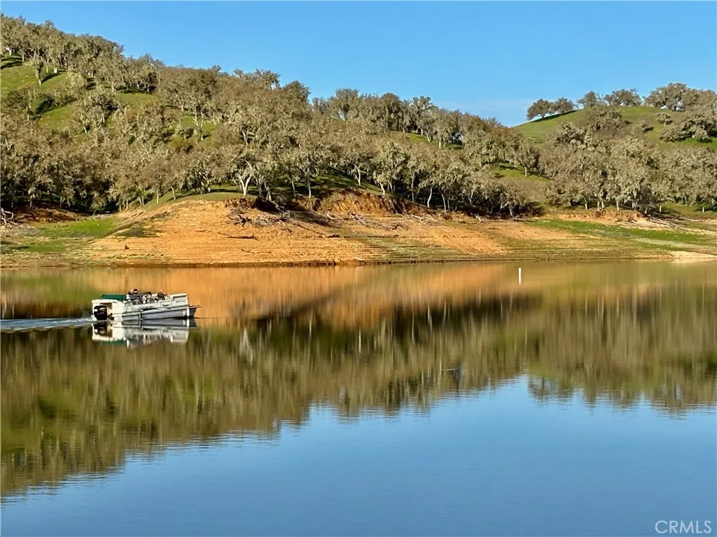 This could be you heading out to fish, bbq on the lake or park in any of the many coves to swim in our warm water.