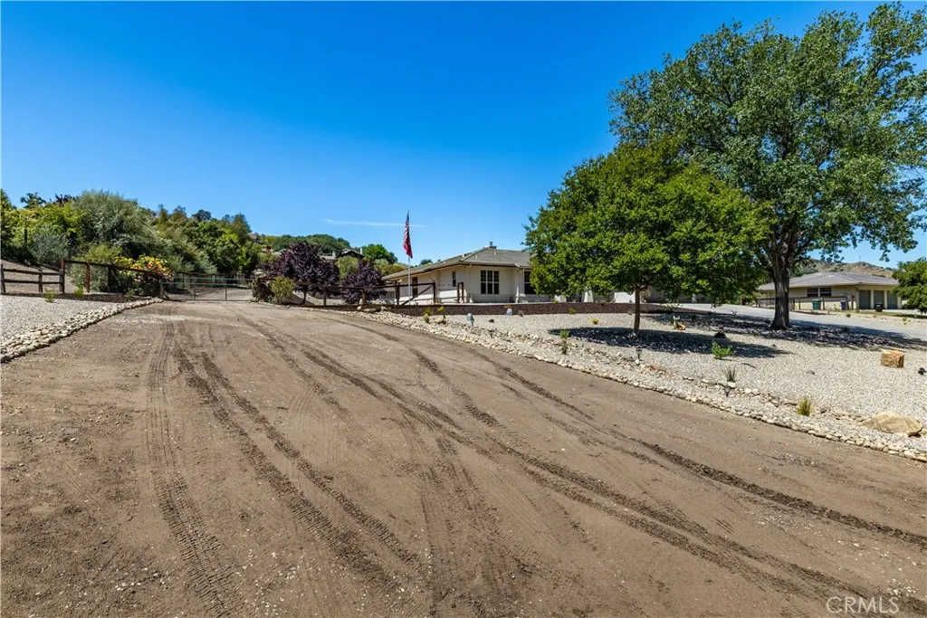 This driveway leads up to large flat area above the home