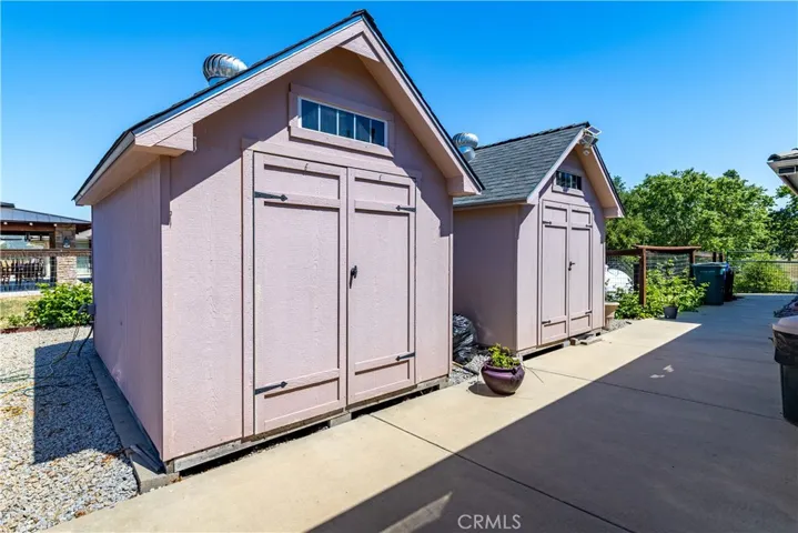 On side of home your already built in storage. There is also a gated entry here from front.
