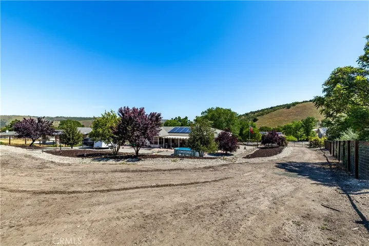 driveway from street to top of back of property where it's already been leveled and ready to build on.
