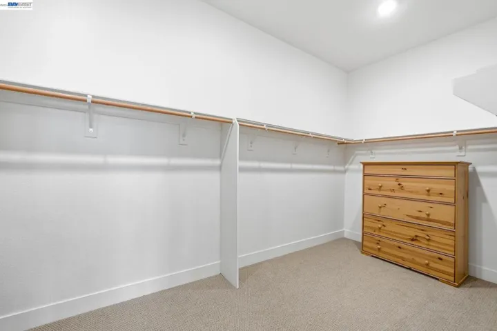 Walk in closet in guest bedroom