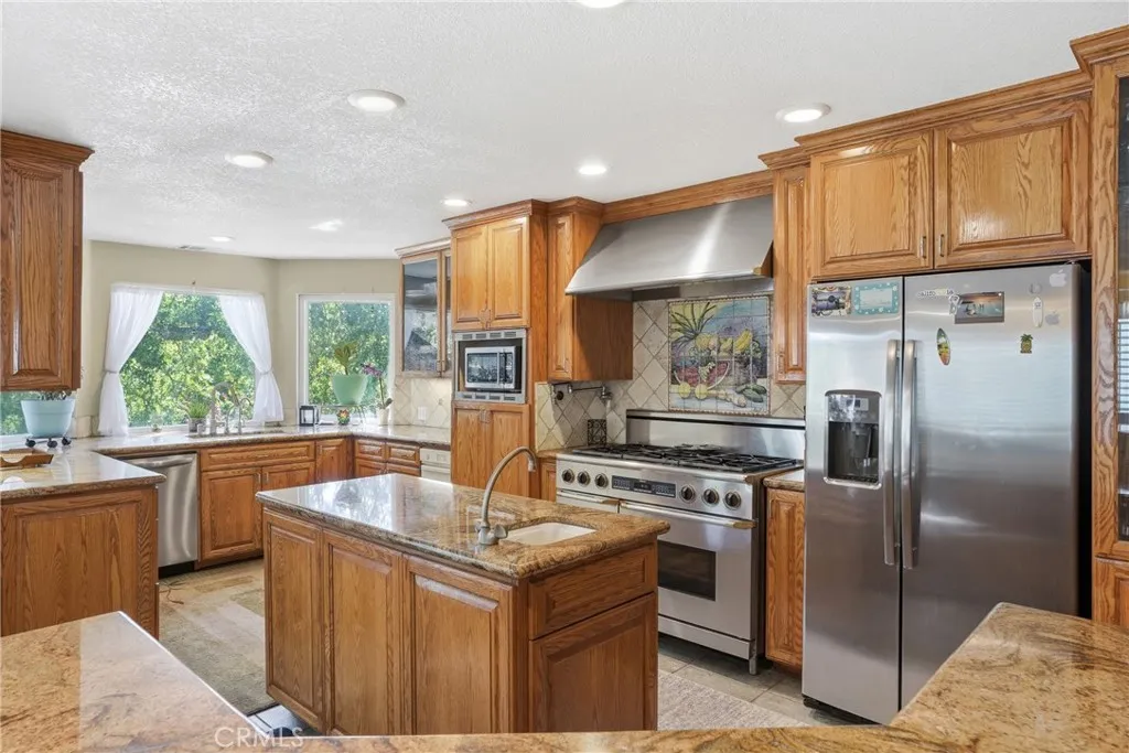 6 burner 48" Dacor range with double oven.