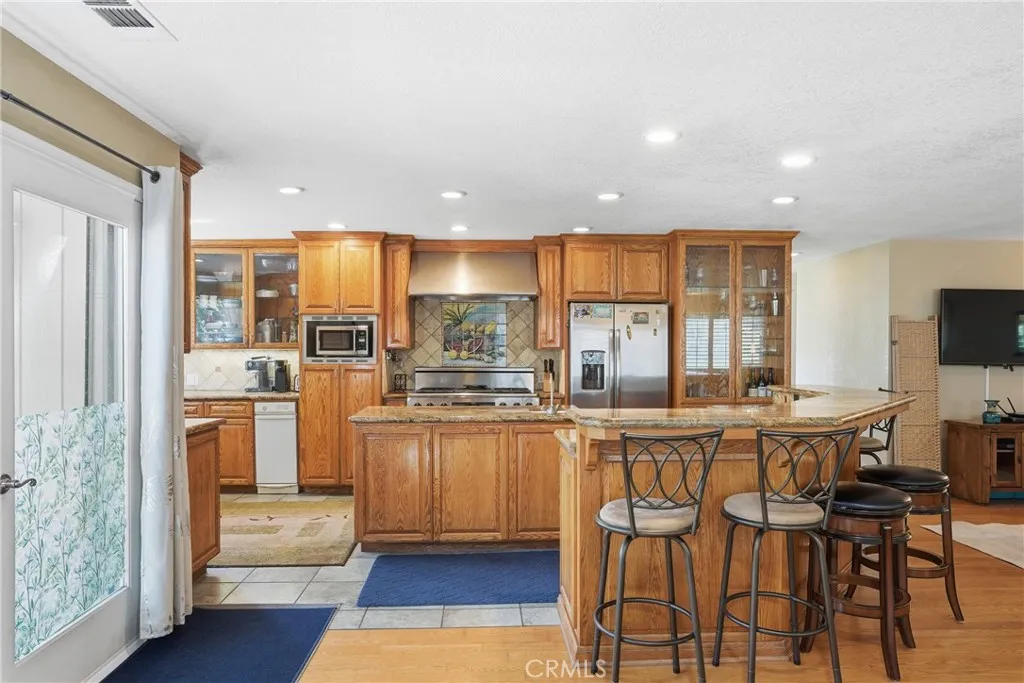 Many cabinet doors and drawers
