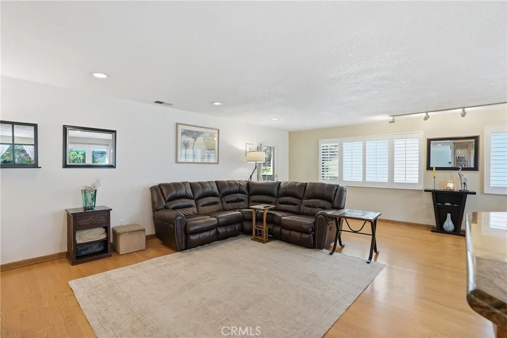 Large enough to accommodate a couple large sofas and other seating.