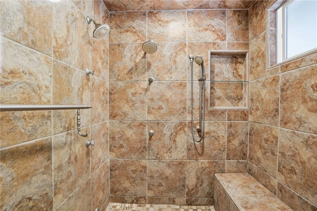 Large multiple head shower with steam.