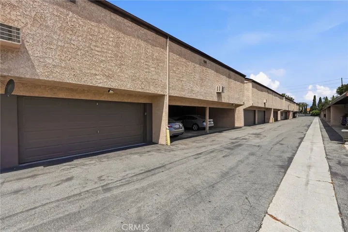 Detached 2 car garage. It houses a storage system and has epoxy flooring.