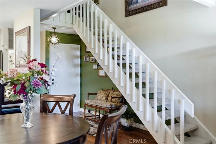 Stairs to loft and 2nd bedroom. Entry door is in background.