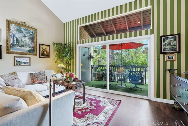 Another view of living room and serene water views.