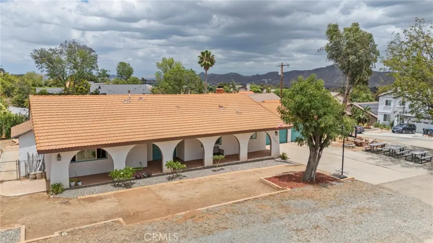 Established property with mature trees and open surroundings